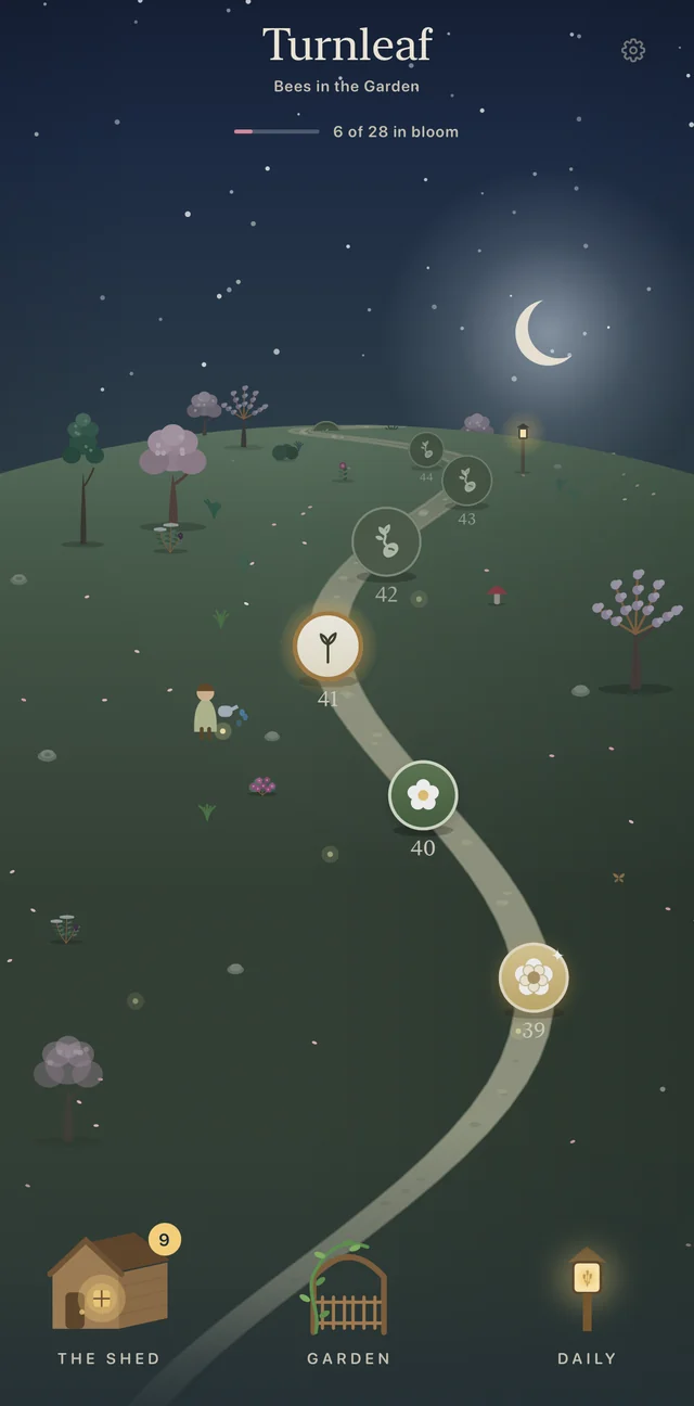 The Path at night under a crescent moon: a pale track winding up a dark hill past numbered flower beds, with the shed, the garden gate and the lit lantern of the Daily at the foot.